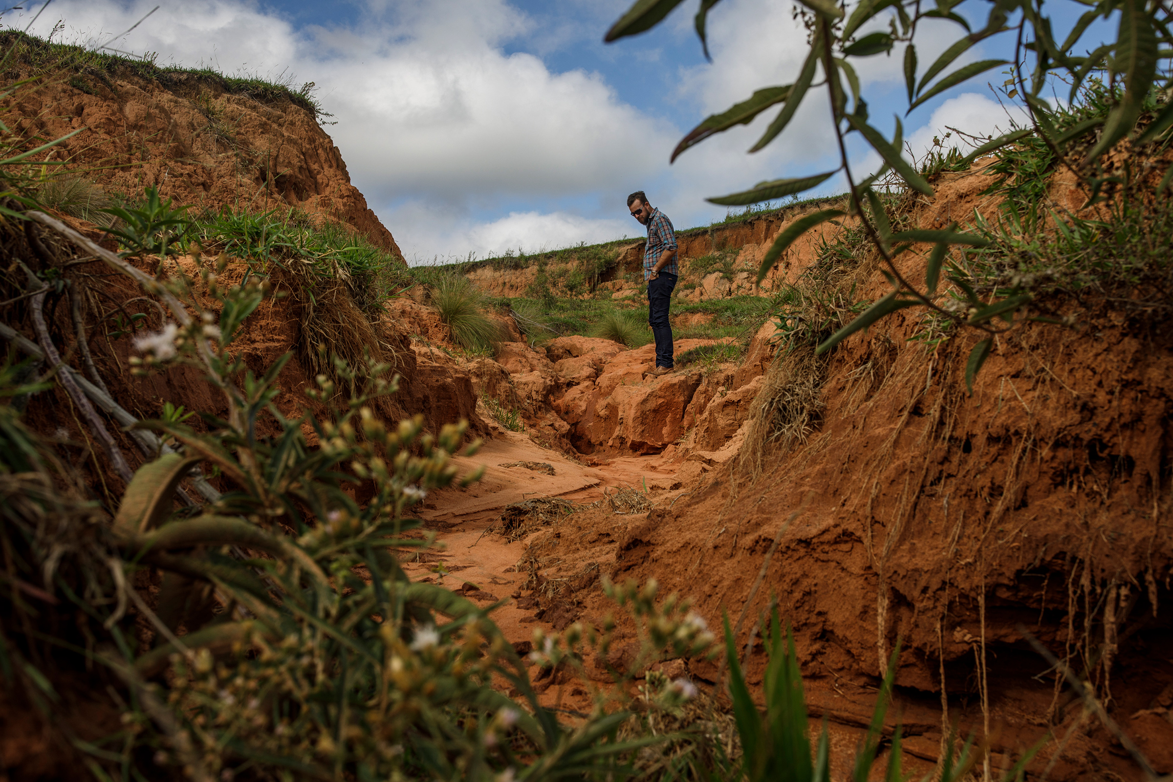 Victor Ziantoni agronomist, brother of Valter Ziantoni, observes a degraded and eroded area in Timburi. (Victor Moriyama for TIME)