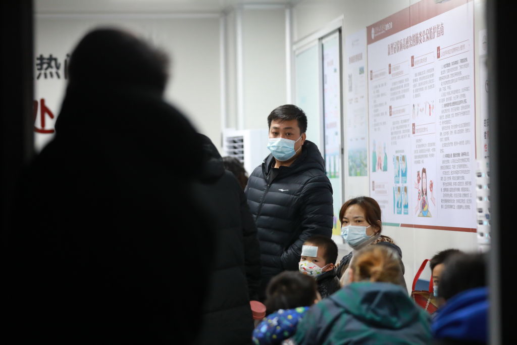 Patients wait to see the doctors at a fever clinic of Dongguan People's Hospital on in Dongguan, Guangdong Province of China, on December 20, 2022. (VCG—Getty Images)