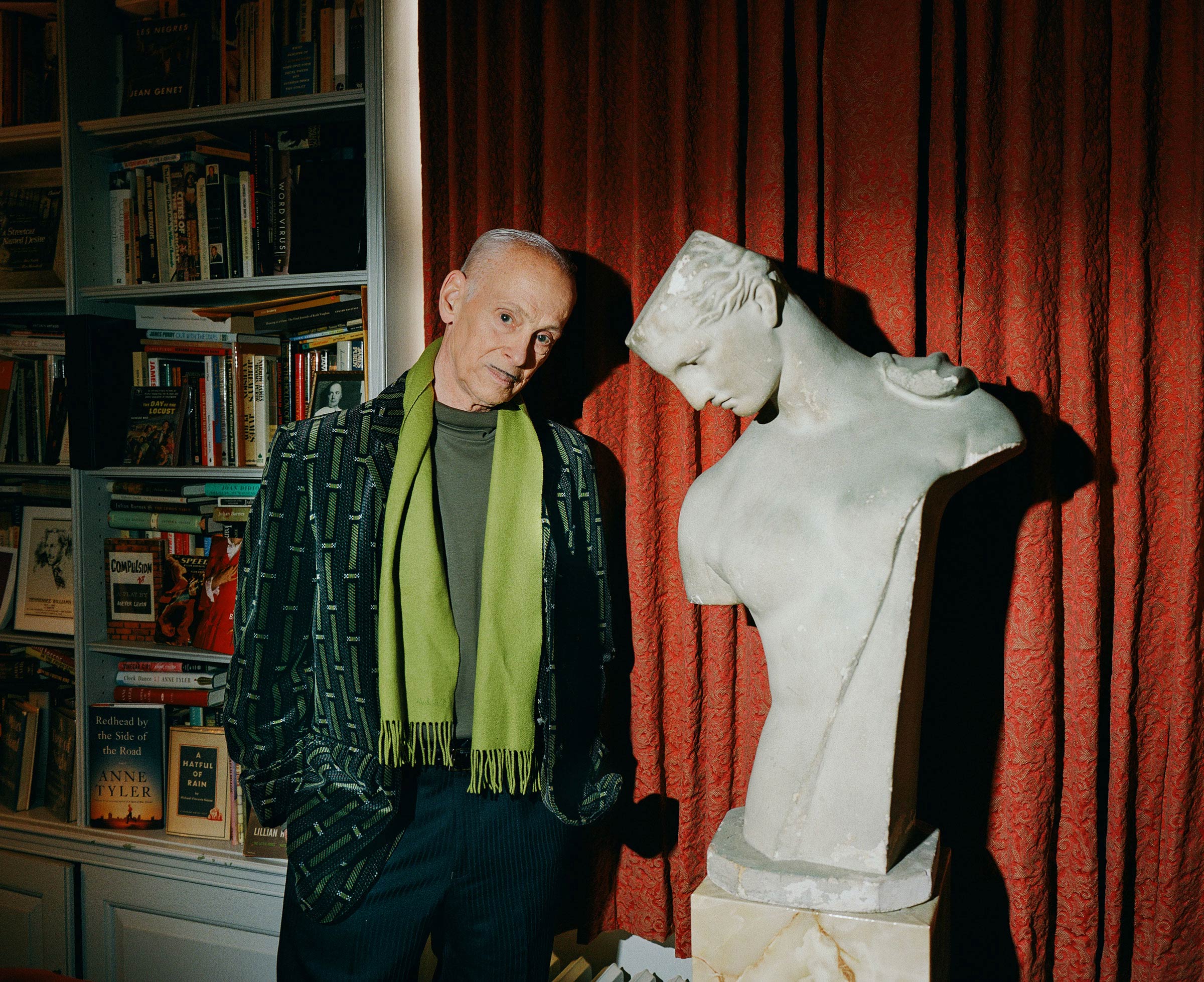 <strong>Director and writer, John Waters, in his Baltimore home.</strong> "<a href="https://time.com/6148756/john-waters-interview-maisel-2022/">America's Filth Elder John Waters Isn't Slowing Down,</a>" February 28 issue. (Peter Fisher for TIME)