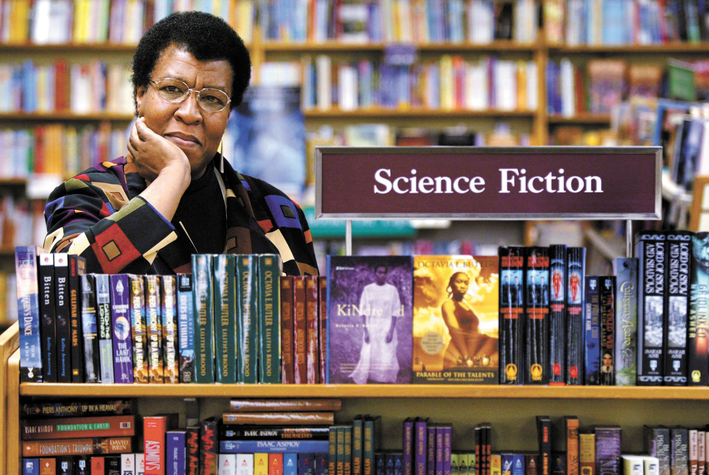 Science Fiction writer Octavia Butler poses for a photograph near some of her novels at University Book Store in Seattle, Wash., on Feb. 4, 2004. (Joshua Trujillo—Seattle Post-Intelligencer/AP)