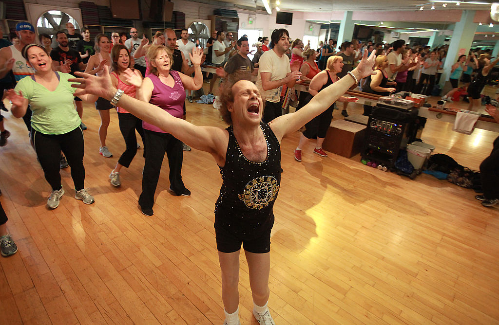 Fitness guru Richard Simmons sings alone with one the the 60s classic tunes playing during one of his classes at Slimmons Studio March 9, 2013, in Beverly Hills. (Brian van der Brug/Los Angeles Times—Getty Images)