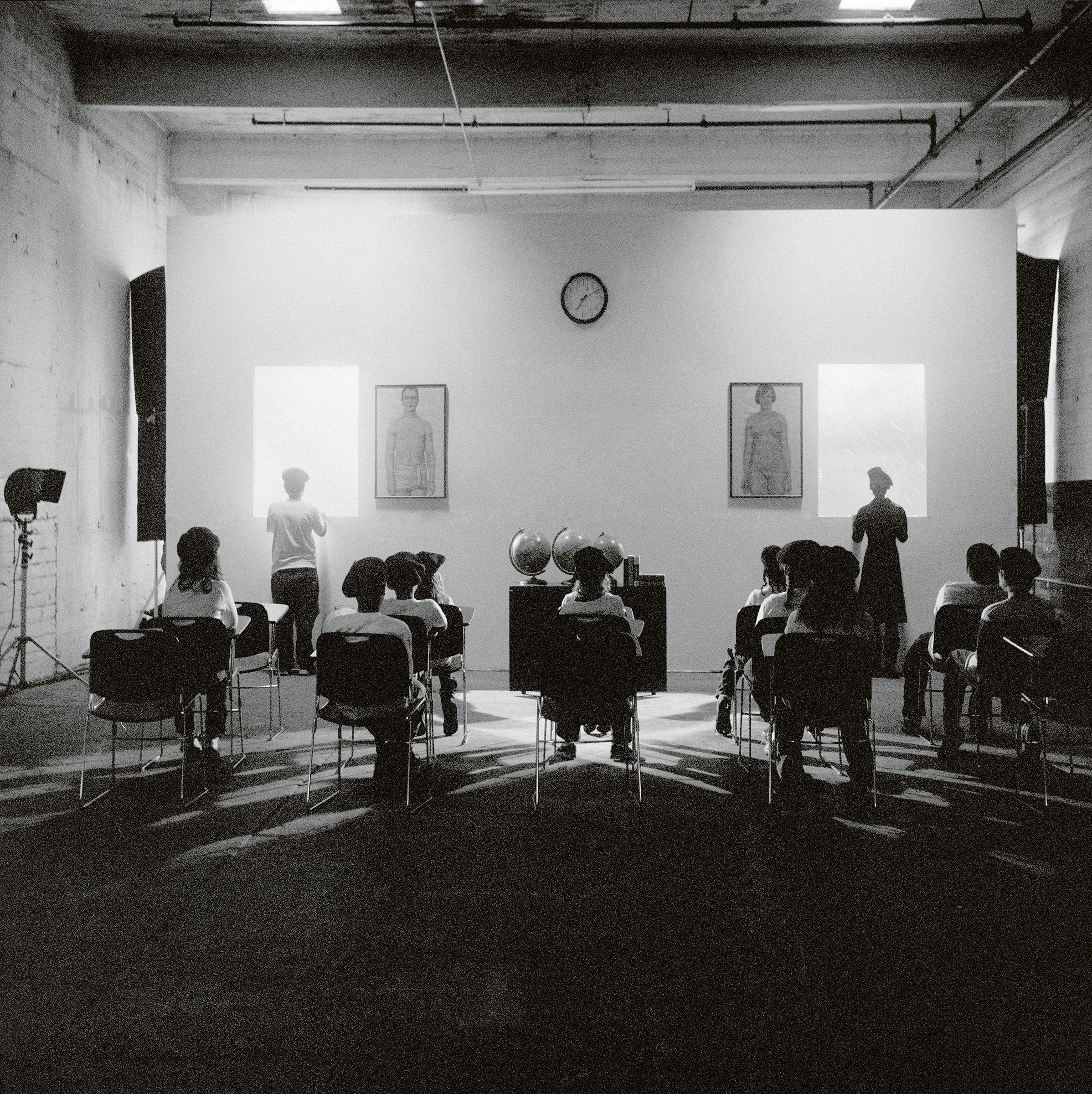 Carrie Mae Weem's A Class Ponders the Future, from the series Constructing History, 2008.
