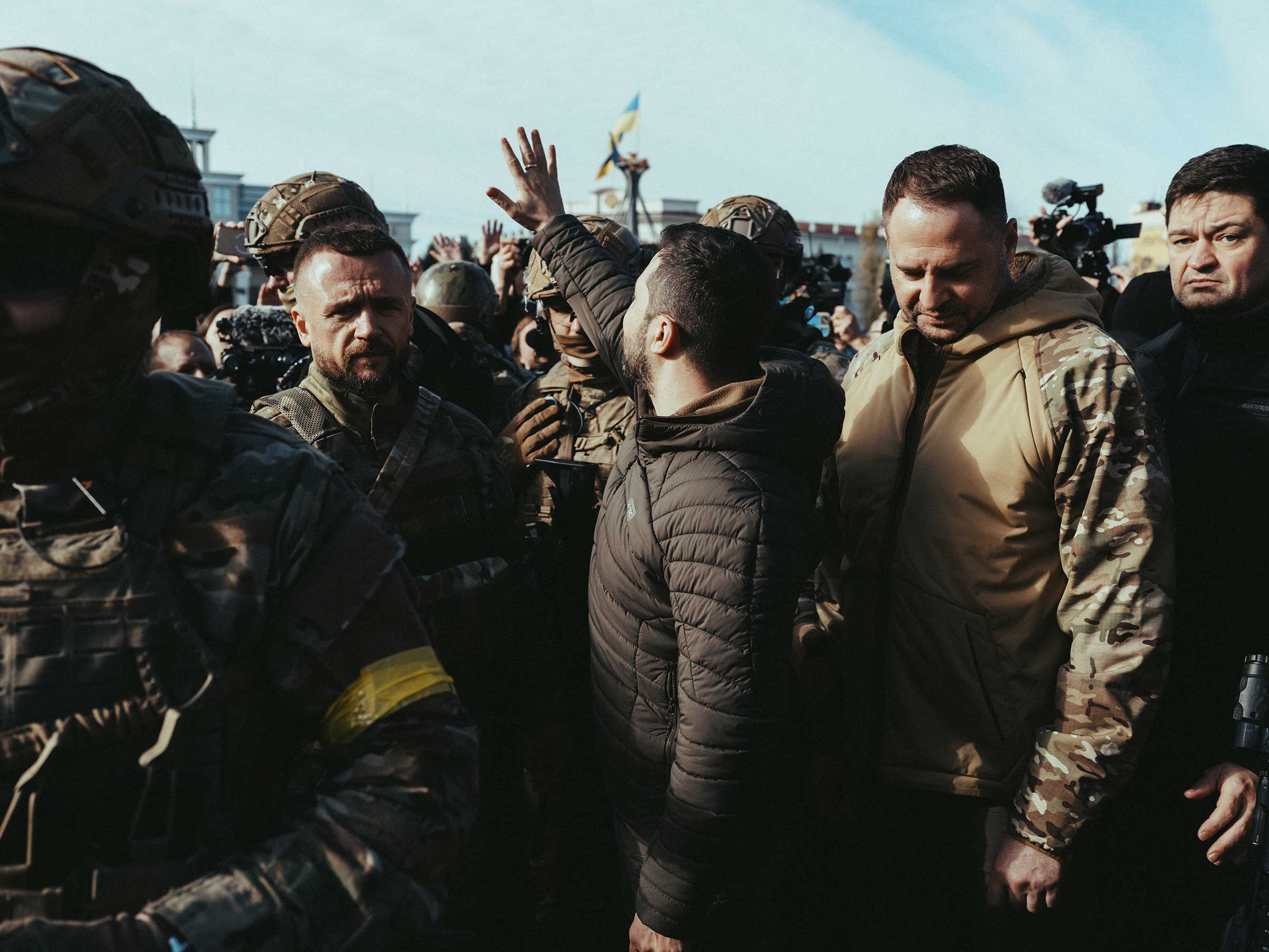 Zelensky greets the crowd during his visit to the liberated city of Kherson on Nov. 14. (Maxim Dondyuk for TIME)