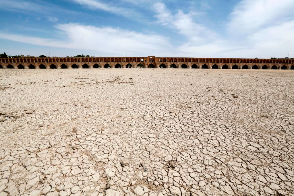 The Si-o-Se Pol bridge ("33 Arches bridge") over the Zayandeh Rud river in Isfahan, Iran, shown on April 11, 2018. Thanks to water extraction, the river runs dry by the time it reaches the city. (ATTA KENARE/AFP— Getty Images)