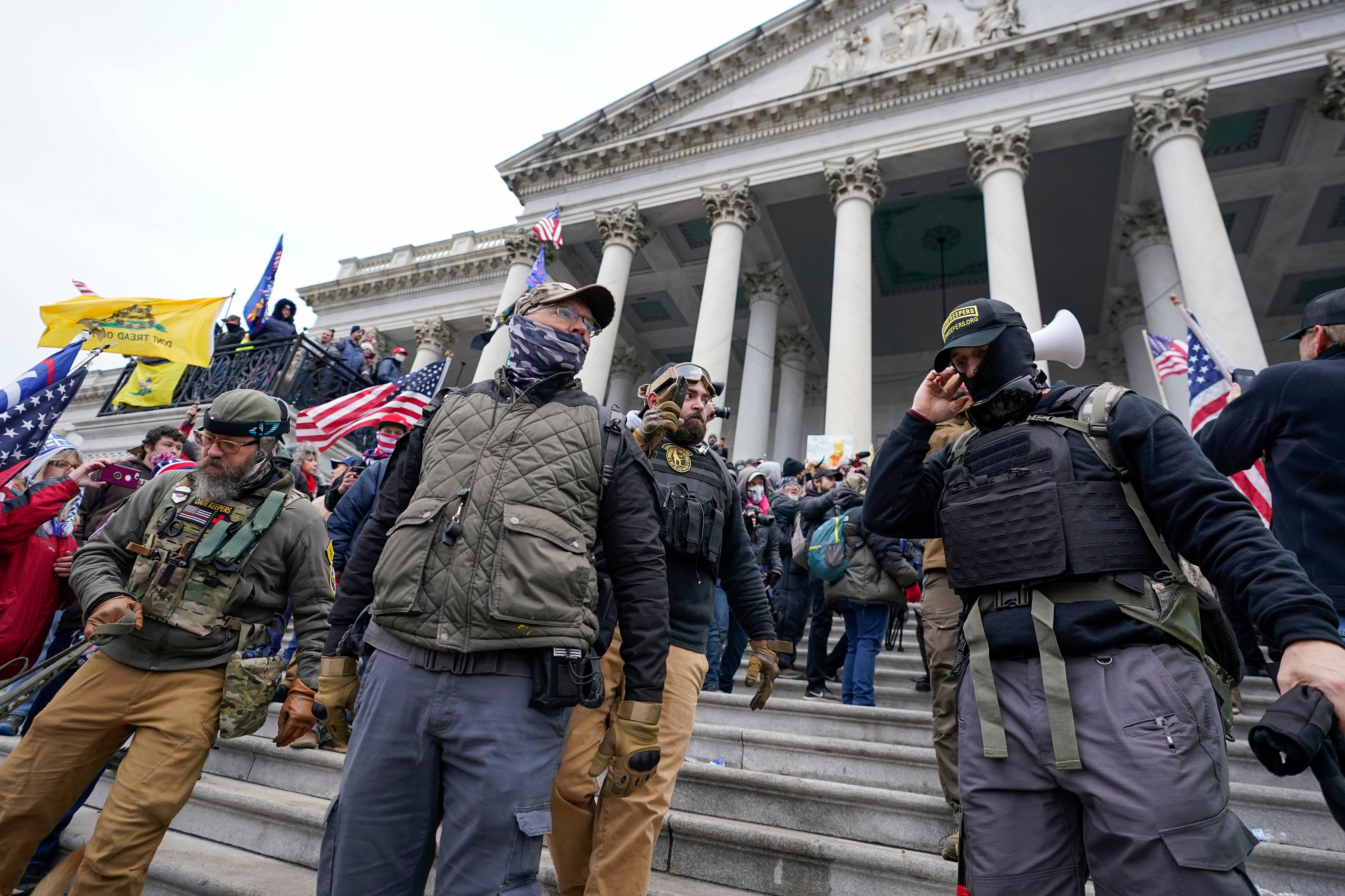 Members of the Oath Keepers extremist group stand on the East Front of the U.S. Capitol on Jan. 6, 2021. (Manuel Balce Ceneta/AP)