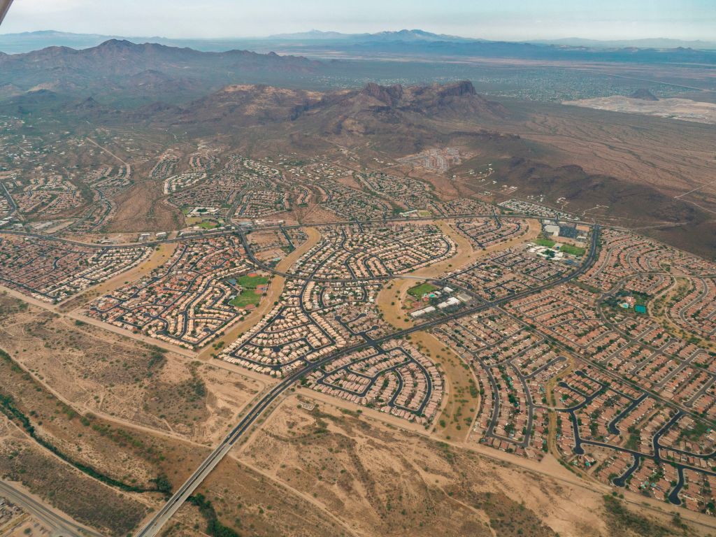 The northeastern edge of the Tucson Mountains populated by two enormous subdivisions, Continental Ranch and Continental Reserve, part of Marana, Pima County, Arizona. (Wild Horizon/Universal Images Group/Getty Images)
