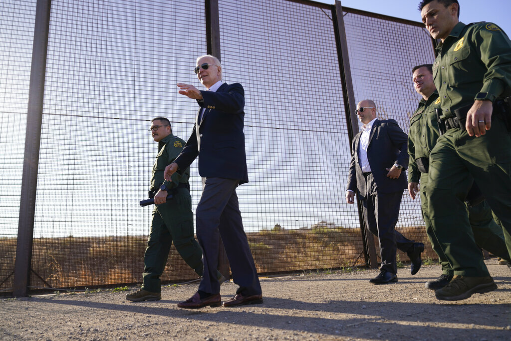 President Joe Biden walks along a stretch of the U.S.-Mexico border in El Paso,  Texas, on Jan. 8, 2023. (Andrew Harnik—AP)