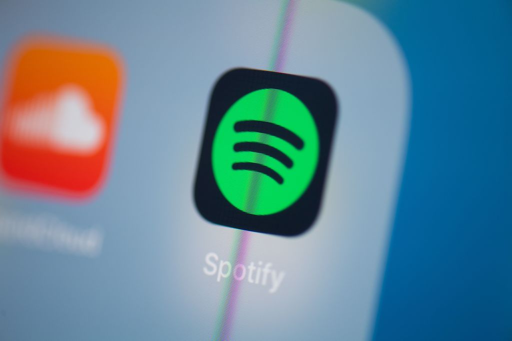 This illustration picture  shows the logo of the Swedish music streaming application Spotify on the screen of a tablet. (Martin Bureau—AFP via Getty Images)