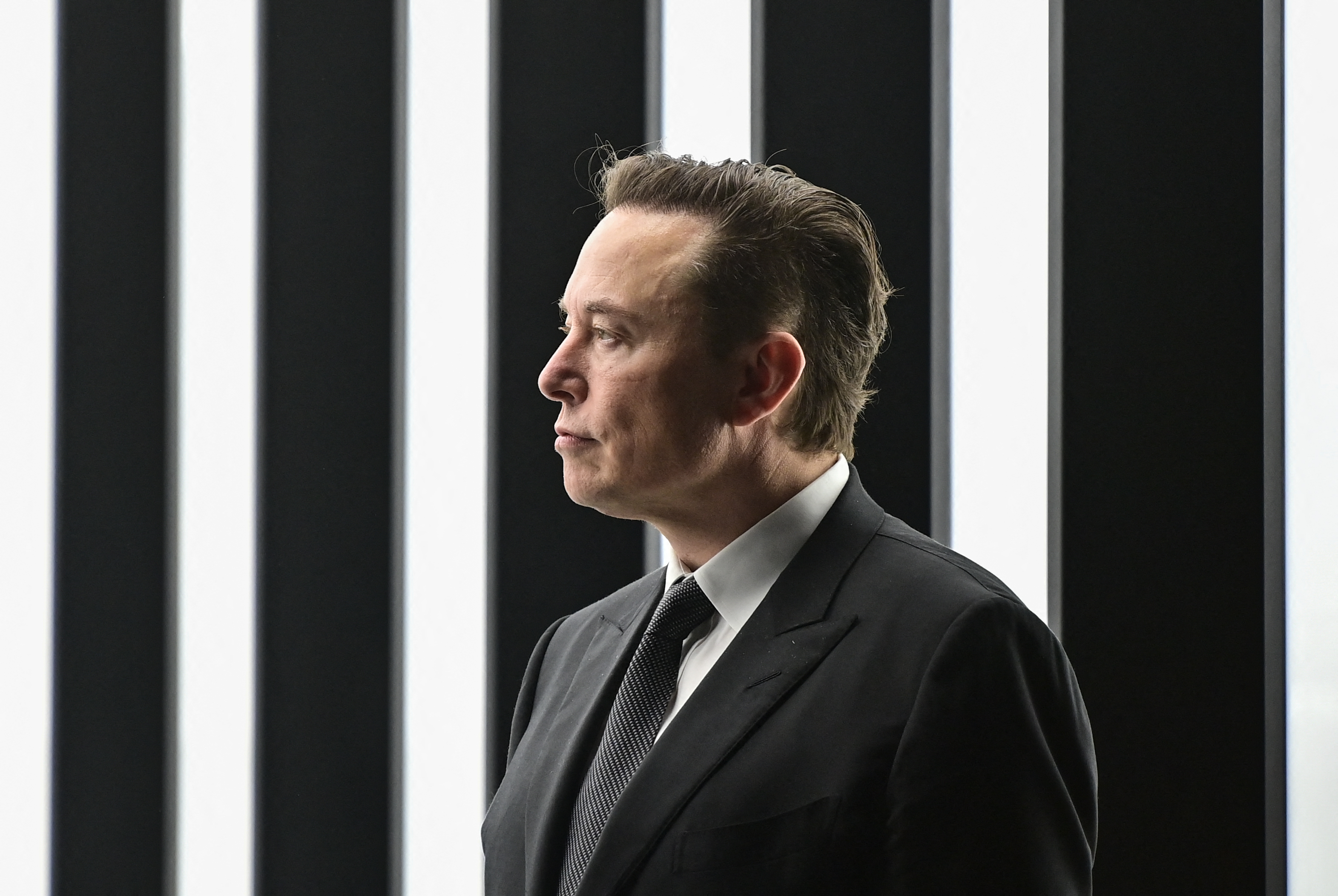 Tesla CEO Elon Musk is pictured as he attends the start of the production at Tesla's "Gigafactory"  in Gruenheide, southeast of Berlin, on March 22, 2022. (PATRICK PLEUL—AFP/Getty Images)