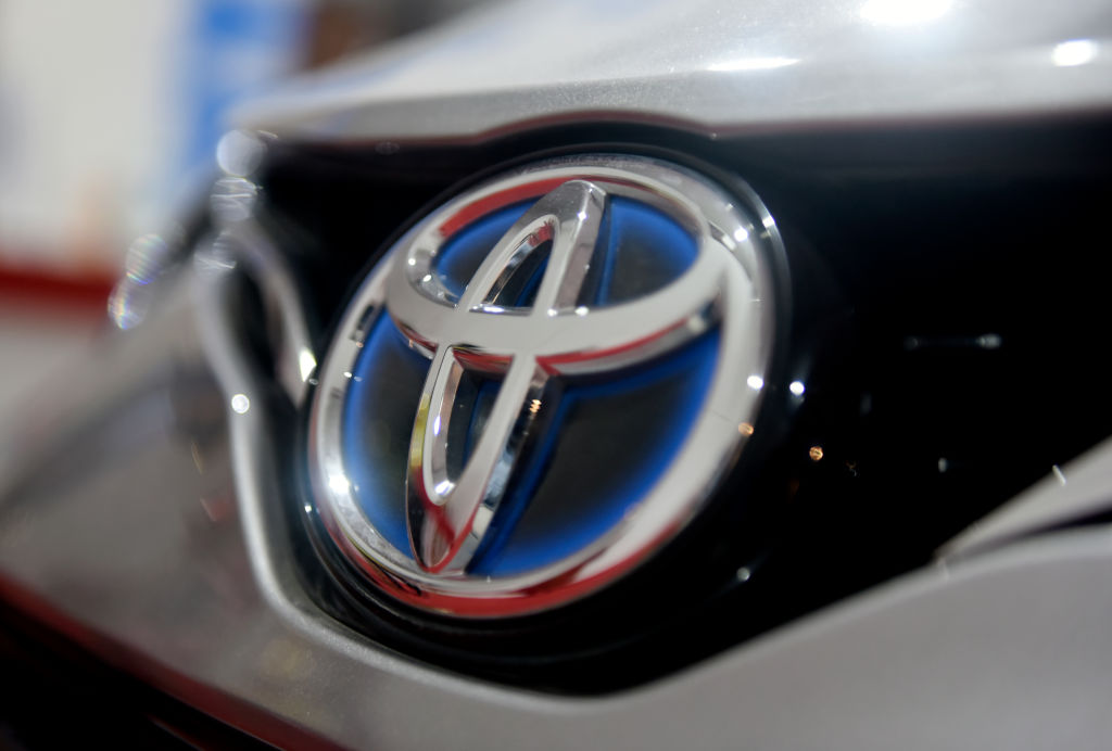 Japanese carmaker Toyota's logo is seen in an electric passenger vehicle, which was on display at Global Investors Meet 2022, in Bangalore, India, last November. (Indranil Aditya—NurPhoto/Getty Images)