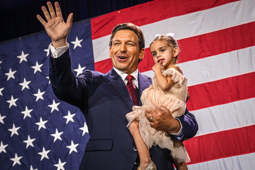Florida Gov. Ron DeSantis holds his daughter Mamie during an election night watch party at the Convention Center in Tampa on November 8, 2022. (Giorgio Viera —AFP via Getty Images)