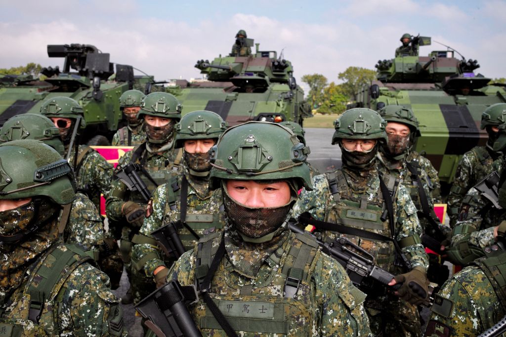 Taiwanese soldiers take part in a demonstration during a visit by Taiwan's President Tsai Ing-wen at a military base in Chiayi, Jan. 6, 2023. (Sam Yeh—AFP/Getty Images)