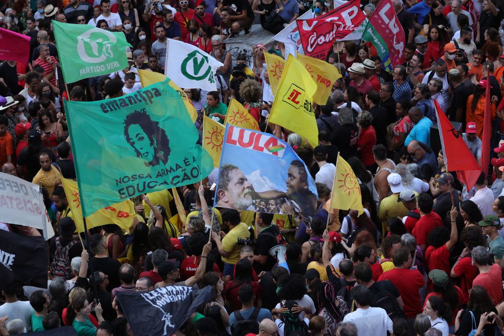 Members of social movements protest in defense of democracy in Porto Alegre, in southern Brazil, on Jan. 9, 2023, a day after supporters of Brazil's former President Jair Bolsonaro invaded the Congress, presidential palace, and Supreme Court in Brasilia. (Silvio Avila—AFP via Getty Images)