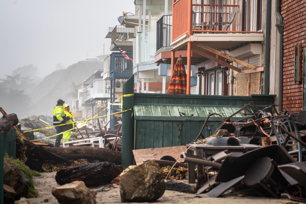 Cleanup has already begun after streets and homes are flooded near the Rio Del Mar State Beach after another powerful storm of rains and high wind hits Californias Central Coast in Aptos, California, on on January 9, 2023. (Melina Mara—The Washington/Getty Images))