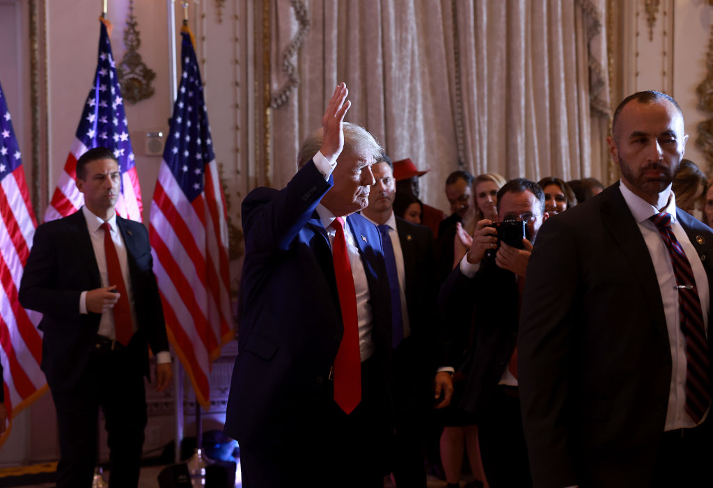 Former U.S. President Donald Trump waves after speaking during an event at his Mar-a-Lago home on November 15, 2022 in Palm Beach, Florida. Trump announced that he was seeking another term in office and officially launched his 2024 presidential campaign. (Joe Raedle—Getty Images)