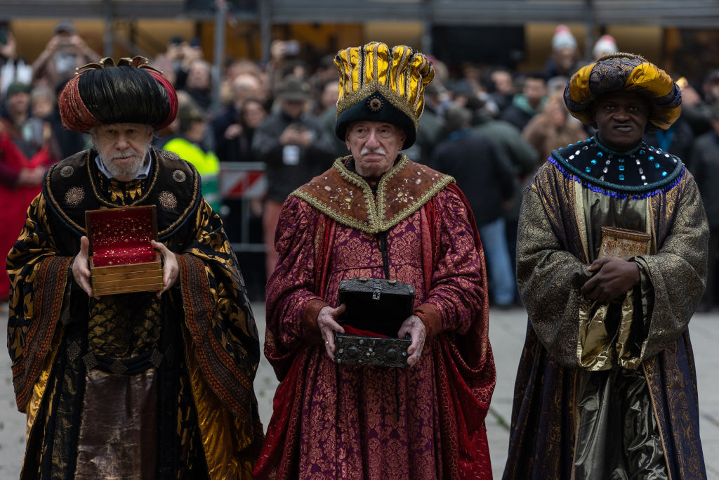 Reenactors dressed as (L-R) Melchior King, Caspar King and Balthasar King march as they take part in the annual Three Kings parade on January 06, 2023 in Milan, Italy.  The procession, celebrated on the Christian feast day of Epiphany, marks the end of the Christmas festivities and honors the story - told in the Gospel of Matthew - of the Three Magi (aka the Three Kings or the Three Wise Men), believed to have followed a bright star to offer gifts - gold, frankincense and myrrh - to the newborn Jesus in Bethlehem. (Emanuele Cremaschi-Getty Images)