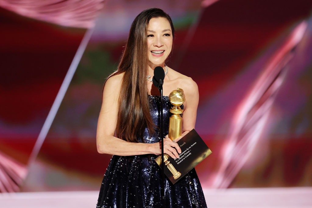 Michelle Yeoh accepts the Best Actress in a Motion Picture – Musical or Comedy award for 'Everything Everywhere All at Once' (Rich Polk—NBC via Getty Images)