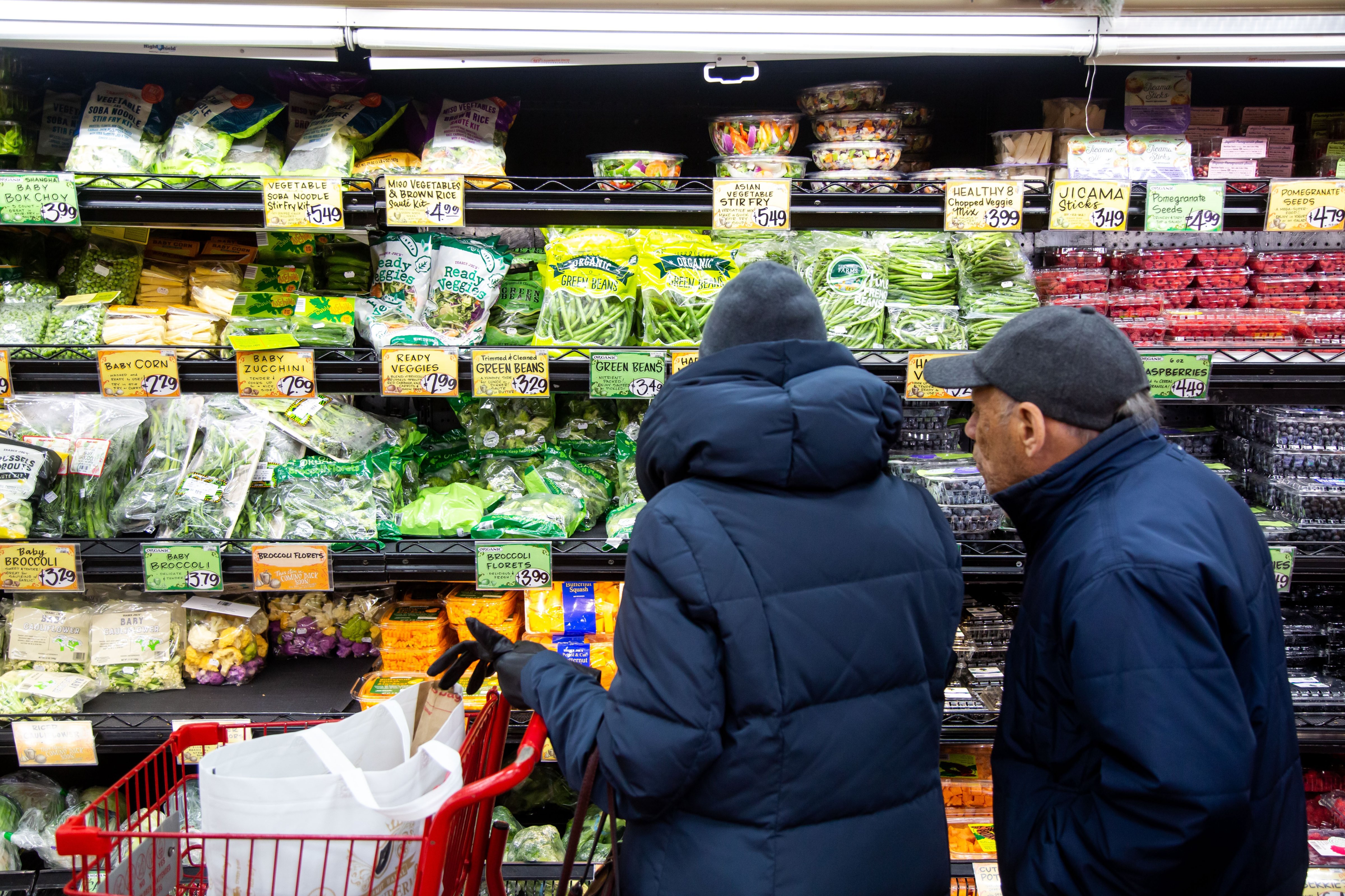 Customers shop at a grocery store in the Brooklyn borough of New York, the United States, Dec. 13, 2022. (Michael Nagle––Xinhua via Getty Images)