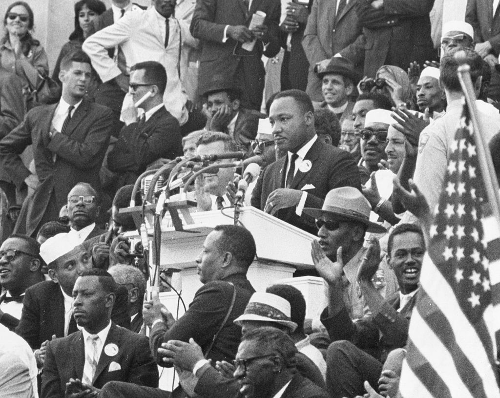 American Religious and Civil Rights leader Dr. Martin Luther King Jr addresses the crowd on the steps of the Lincoln Memorial during the March on Washington, Washington D.C., August 28, 1963. (Getty Images)