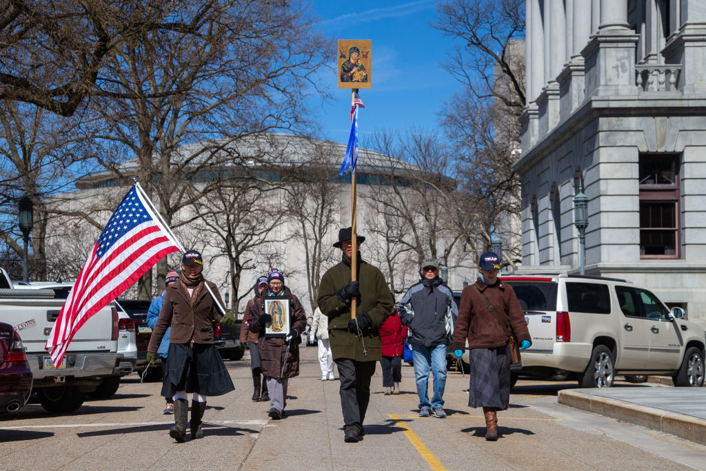 Pro-Trump Christian nationalist Jericho Marchers march around the Pennsylvania State Capitol in Harrisburg, Pa. after meeting with several Republican state legislators on March 15, 2021. (Paul Weaver—SOPA Images/LightRocket/Getty Images)
