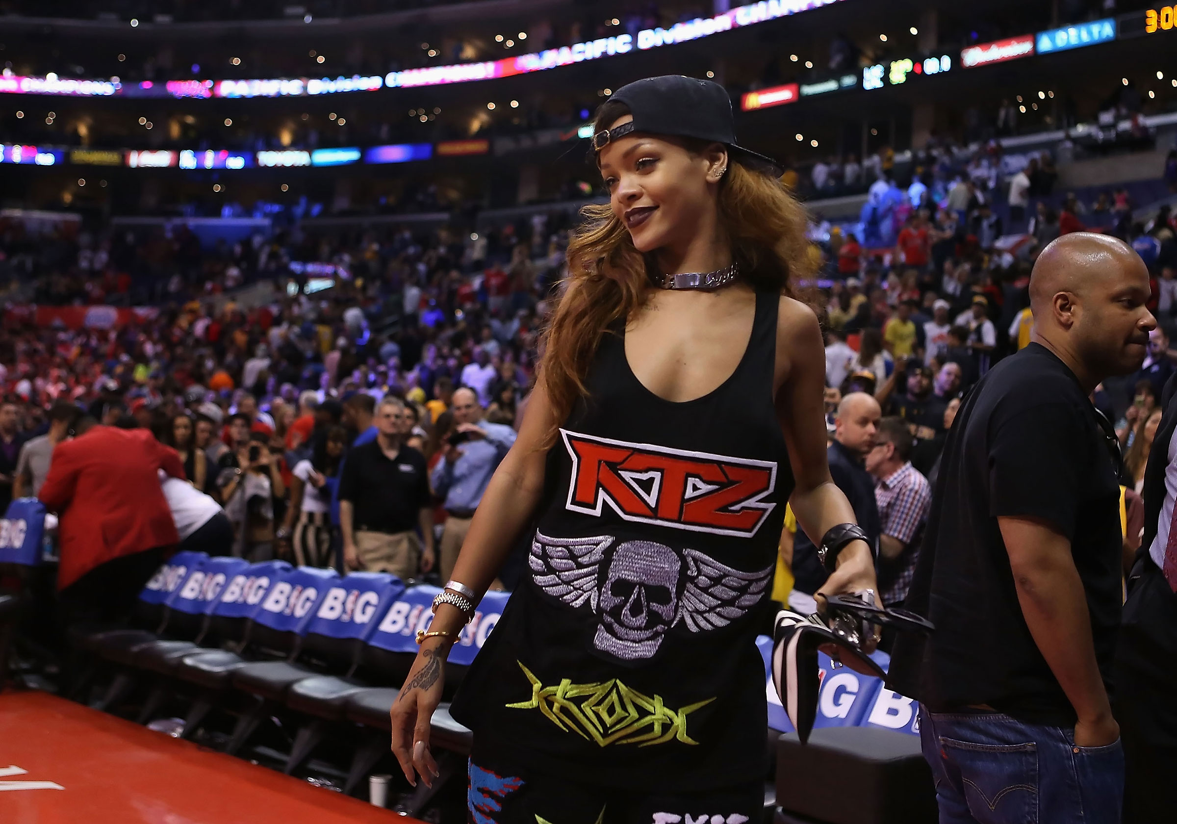 Rihanna walks off the court following the NBA game between the Los Angeles Lakers and the Los Angeles Clippers in Los Angeles, on April 7, 2013. (Christian Petersen—Getty Images)
