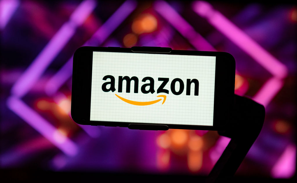 In this photo illustration, the logo of Amazon is seen displayed on a mobile phone screen. (Idrees Abbas–SOPA Images/LightRocket/Getty Images)