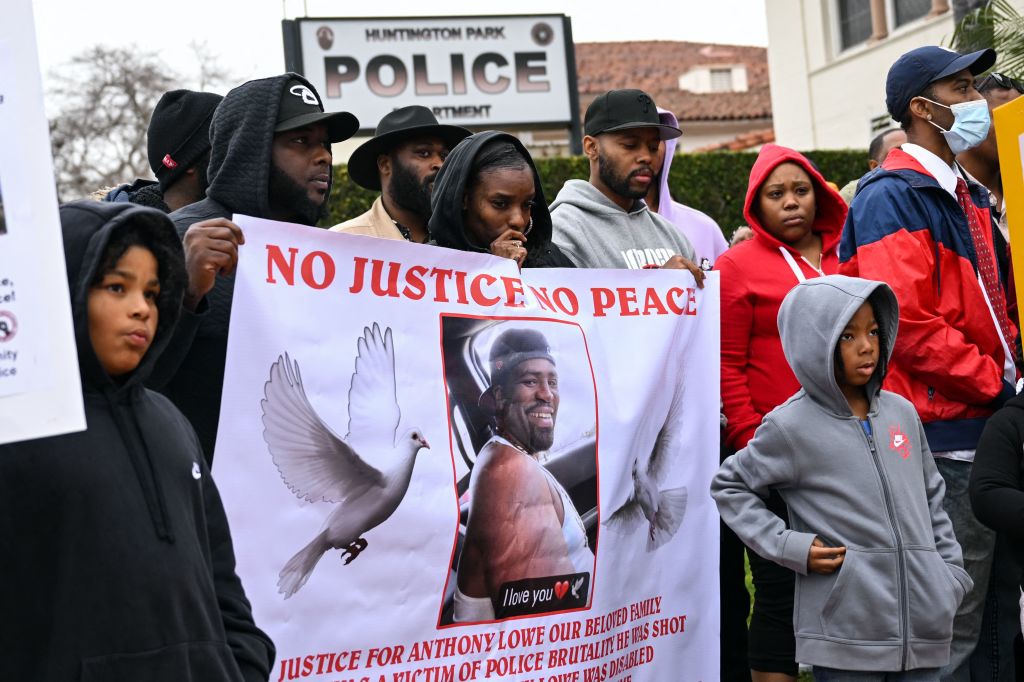 Family and friends of Anthony Lowe Jr., a double amputee who was fatally shot by the police last week, hold a news conference to demand an investigation into his death outside of the Huntington Park Police Department on Jan. 30, 2023. (Patrick T. Fallon—AFP/Getty Images)