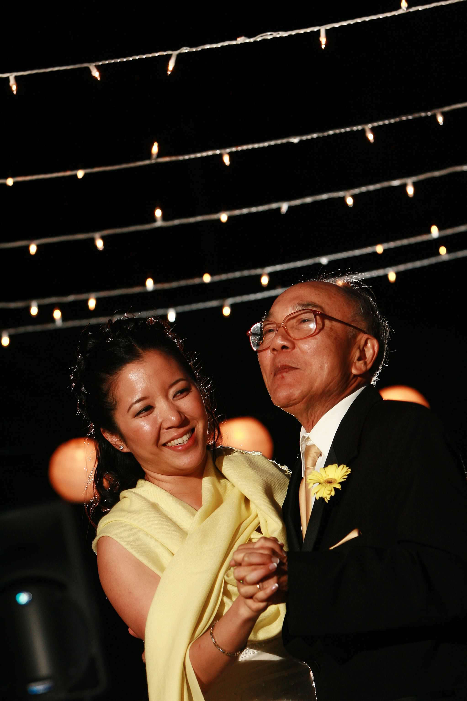 The author and her father, dancing together at Phan's wedding in 2006. (Craig Mitchelldyer)