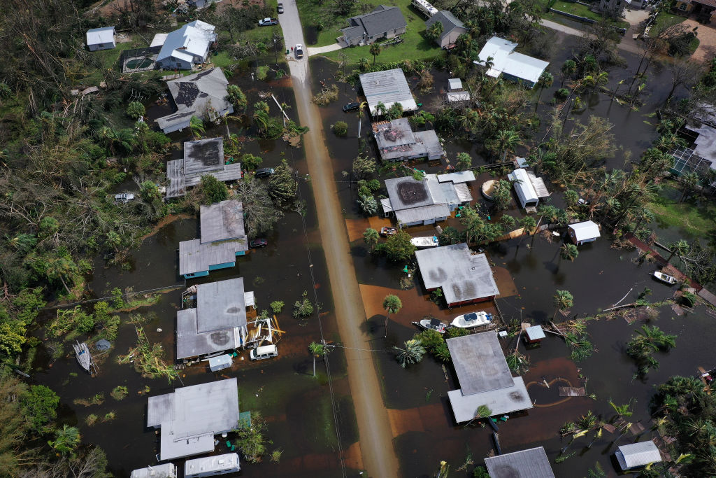 In this aerial view, flooded homes are shown after Hurricane Ian moved through the Gulf Coast of Florida on September 29, 2022 in Port Charlotte, Florida. (Win McNamee—Getty Images)