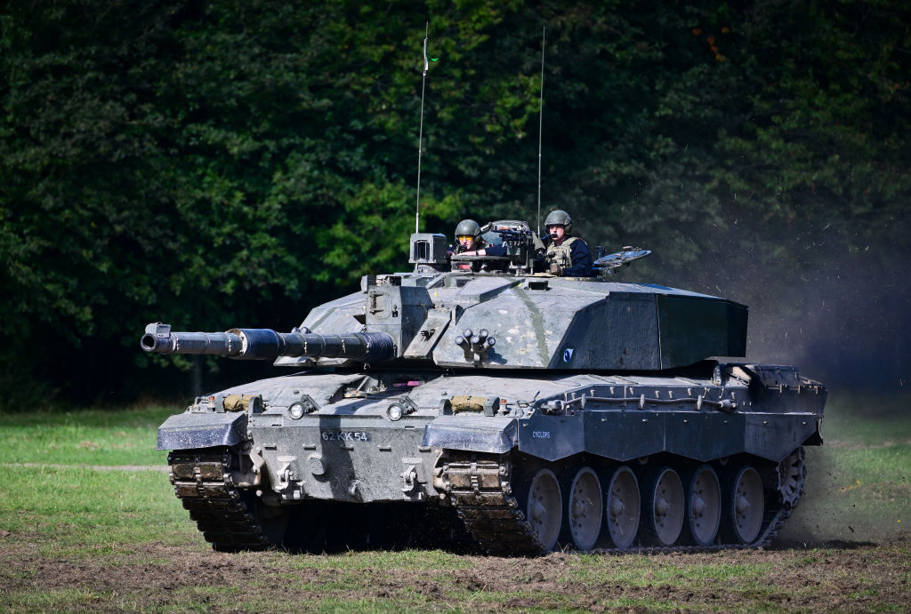 Challenger 2 main battle tank is displayed for the families watching The Royal Tank Regiment Regimental Parade, on September 24, 2022 in Bulford, England. (Finnbarr Webster—Getty Images)