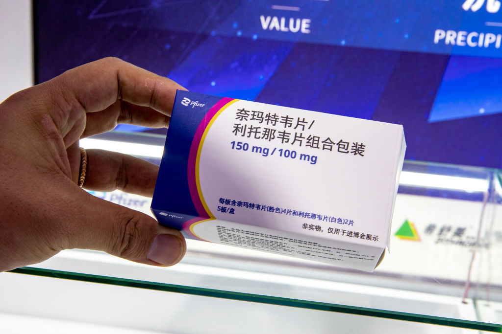 Tablets of nirmatrelvir and ritonavir are on display at Pfizer booth during the 5th China International Import Expo (CIIE) at the National Exhibition and Convention Center on Nov. 7, 2022 in Shanghai. (VCG—Getty Images)