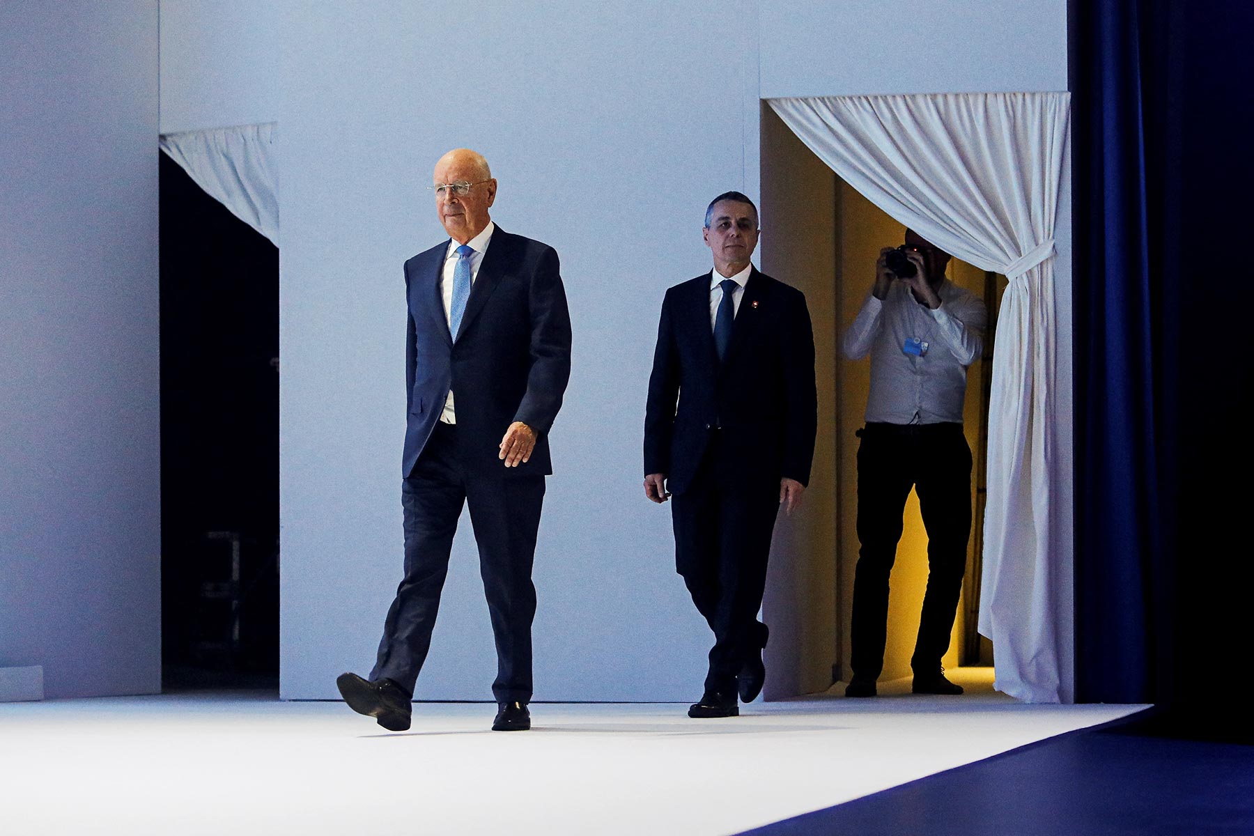 Swiss President Ignazio Cassis and Founder and Executive chairman Klaus Schwab arrive for the opening ceremony of the World Economic Forum in Davos, Switzerland May 23, 2022. (Arnd Wiegmann—Reuters)