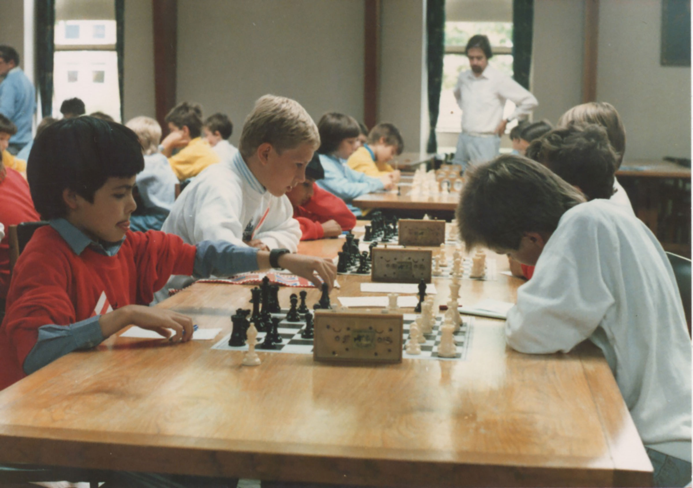Hassabis, left, captaining the England under-11s chess team at the age of 9