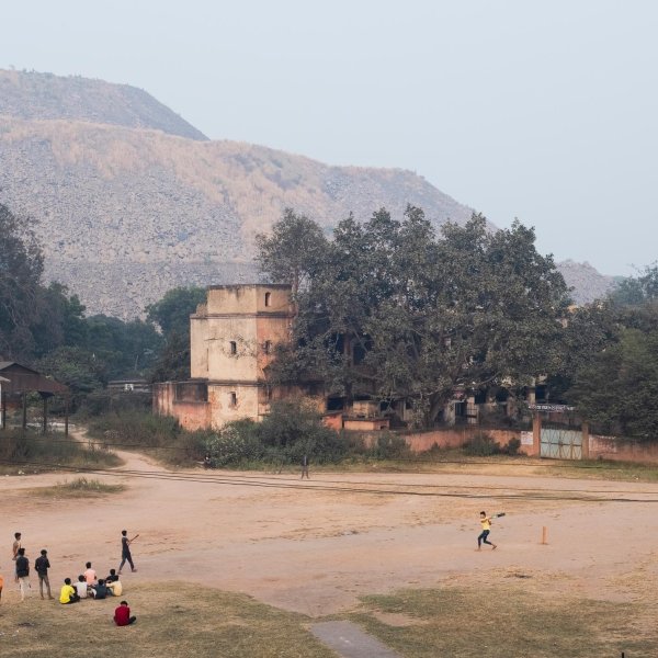 Local residents play a game of cricket outside of the Jharia coalfield in Dhanbad, in the state of Jharkhand, and home to India’s largest coal reserves.