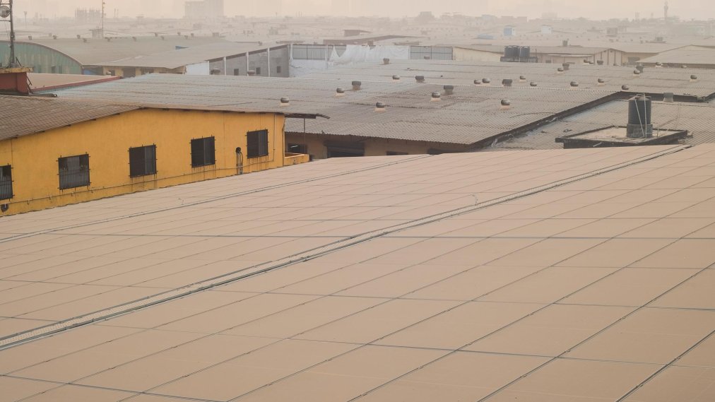 Solar Panels installation on the rooftop of a warehouse in Bhiwandi, a commercial city and major trade center that connects Mumbai and the rest of India through the Mumbai–Agra highway.