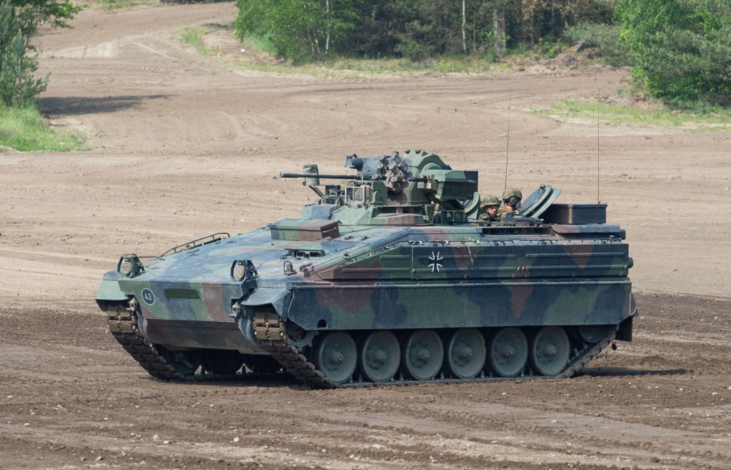 During a demonstration of the Very High Readiness Joint Task Force (VJTF), a Marder infantry fighting vehicle drives on a training field in 2019. (Christophe Gateau—Picture Alliance/Getty Images)
