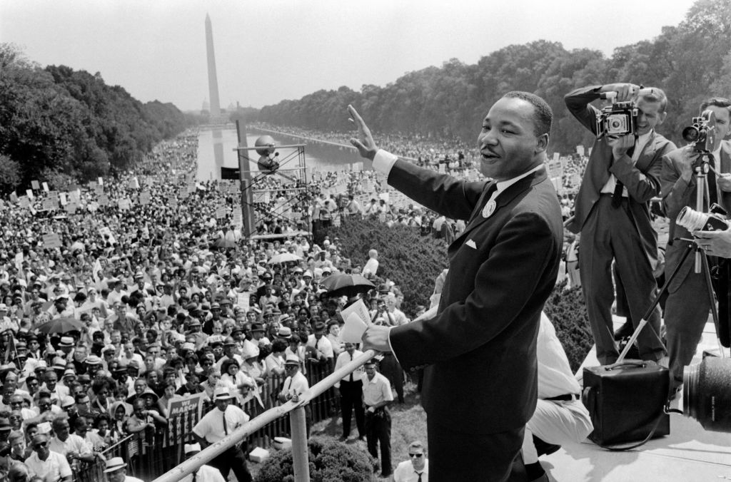 The civil rights leader Martin Luther King (C) waves to supporters on the Mall in Washington D.C. during the "March on Washington," Aug. 28, 1963. (AFP—Getty Images)