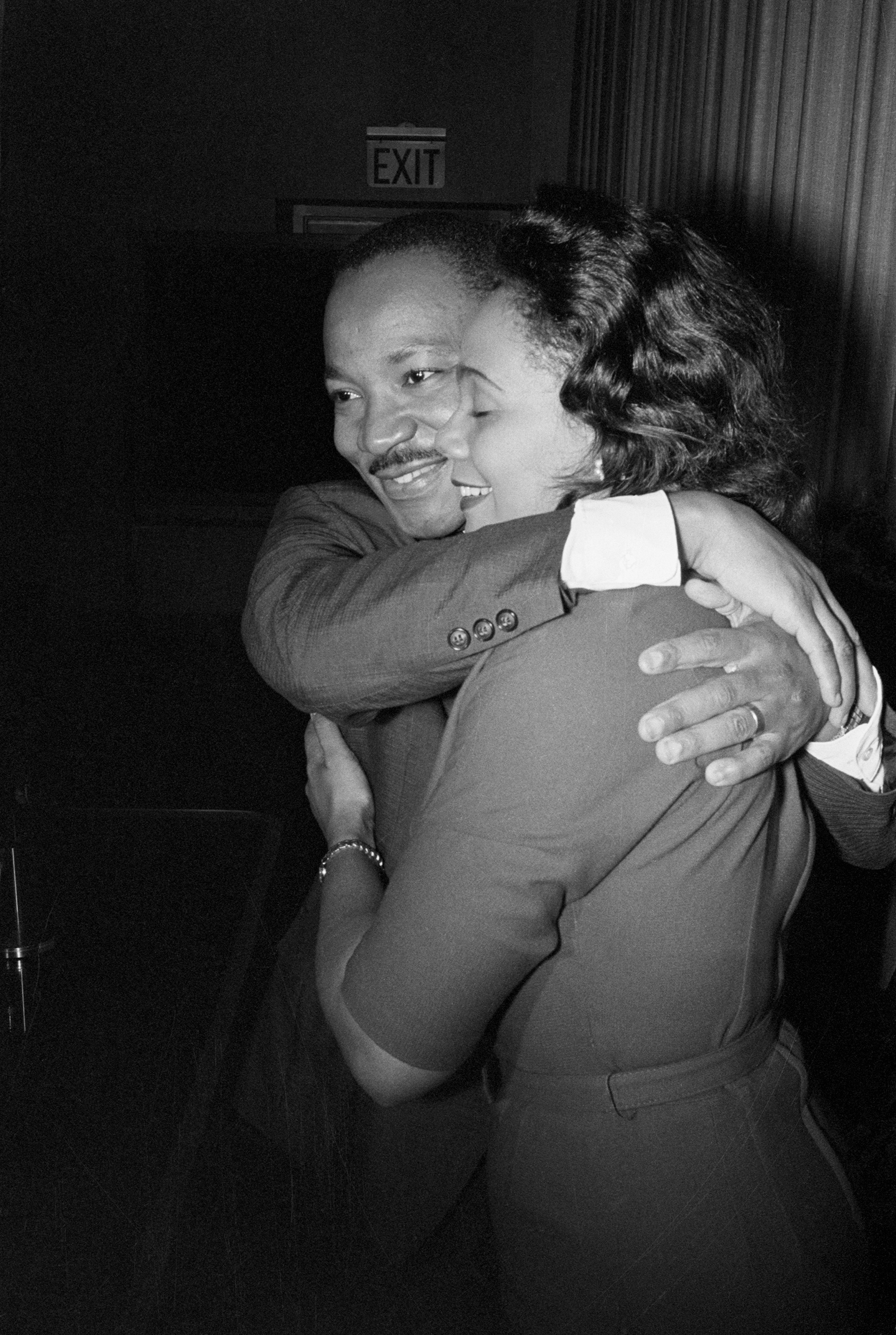 Dr. Martin Luther King, Jr. hugs his wife Coretta Scott King during a news conference following the announcement that he had been awarded the Nobel Peace Prize, in 1964. (Bettmann Archive/Getty Images)