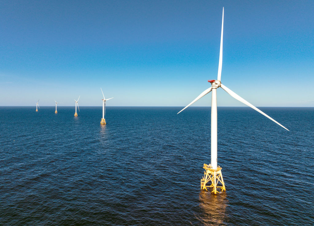 Wind turbines generate electricity at the Block Island Wind Farm on July 7, 2022 near Block Island, Rhode Island. The five-turbine, 30 MW project was developed by Deepwater Wind and began operations in December, 2016. (John Moore—Getty Images)