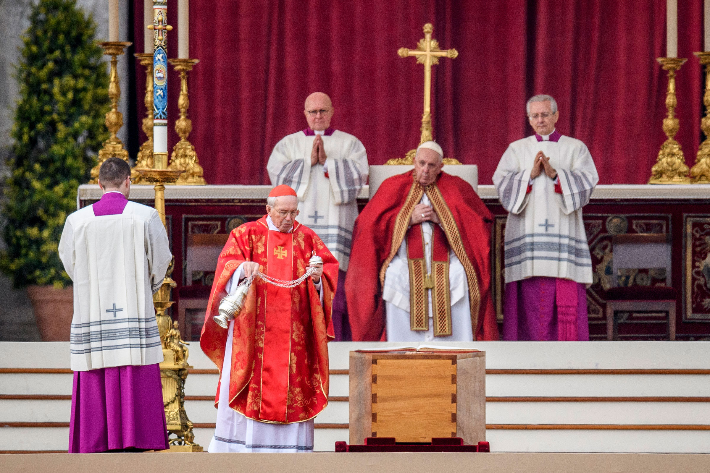Cardinal Giovanni Battista Re swings a thurible of incense on the coffin of Pope Emeritus Benedict XVI during the funeral mass at St. Peter's square on Jan. 5, 2023 in Vatican City.