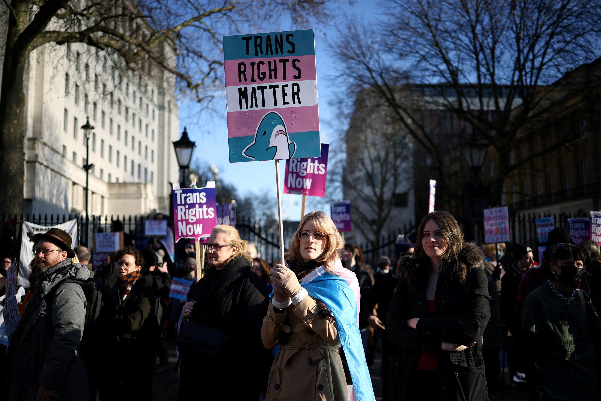 Transgender rights supporters protest in favour of Scottish gender reform bill outside Downing Street in London on Jan. 21. (Henry Nicholls—Reuters)