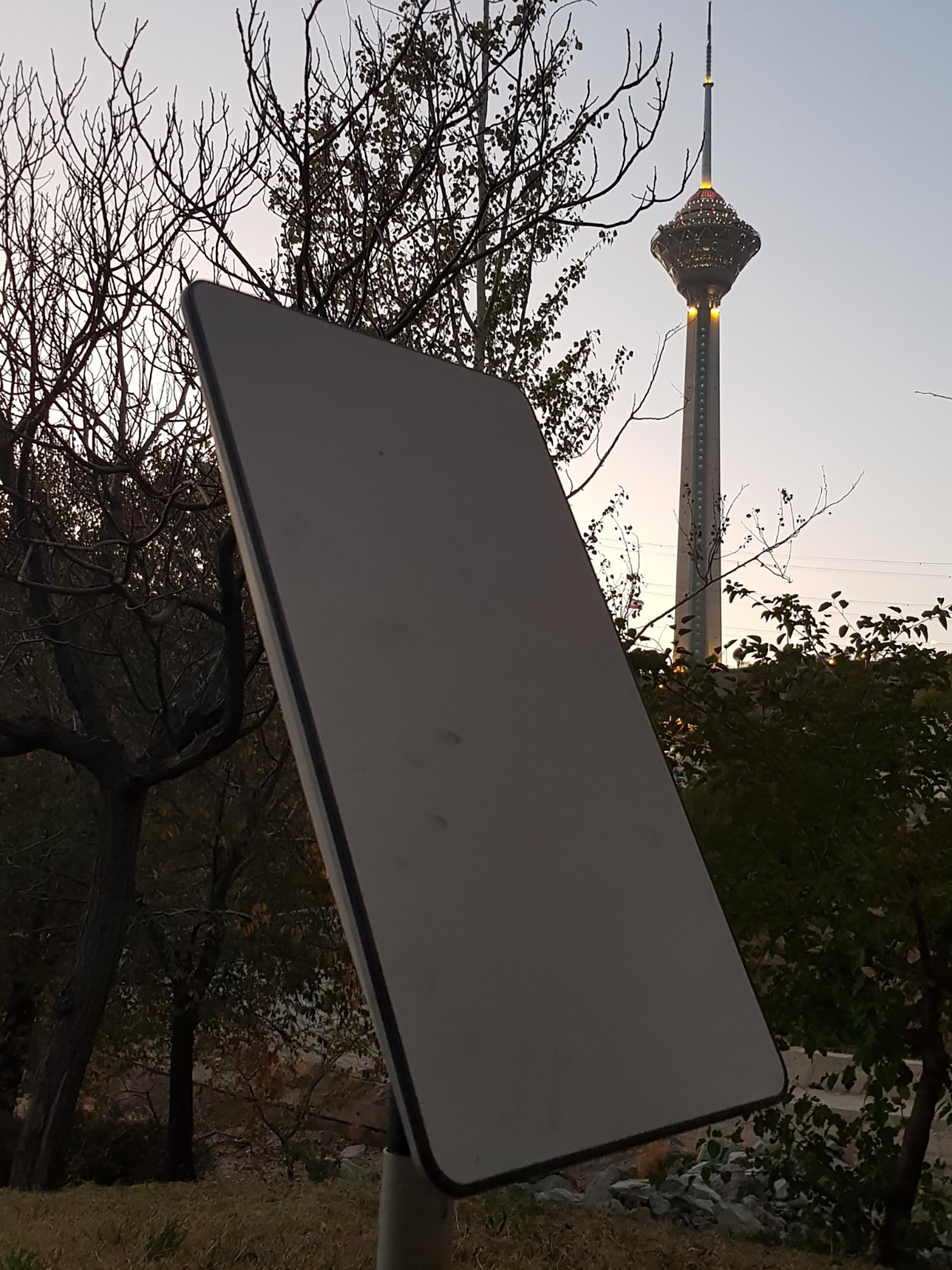 A Starlink dish in Tehran, with the iconic Milad Tower in the background photographed in early November. Activists inside Iran looked for photo sites that could communicate that the dishes were in fact there. (Courtesy)