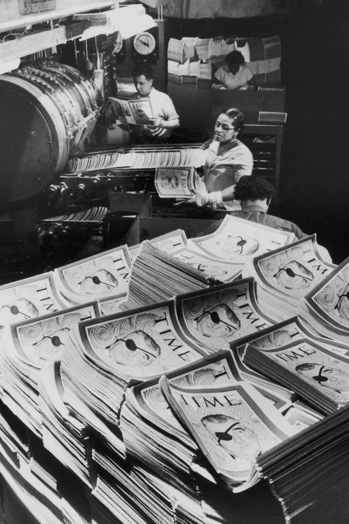 Issues of TIME are stacked at the R.R. Donnelley & Sons Company printing press in Crawfordsville, Ind., 1956.