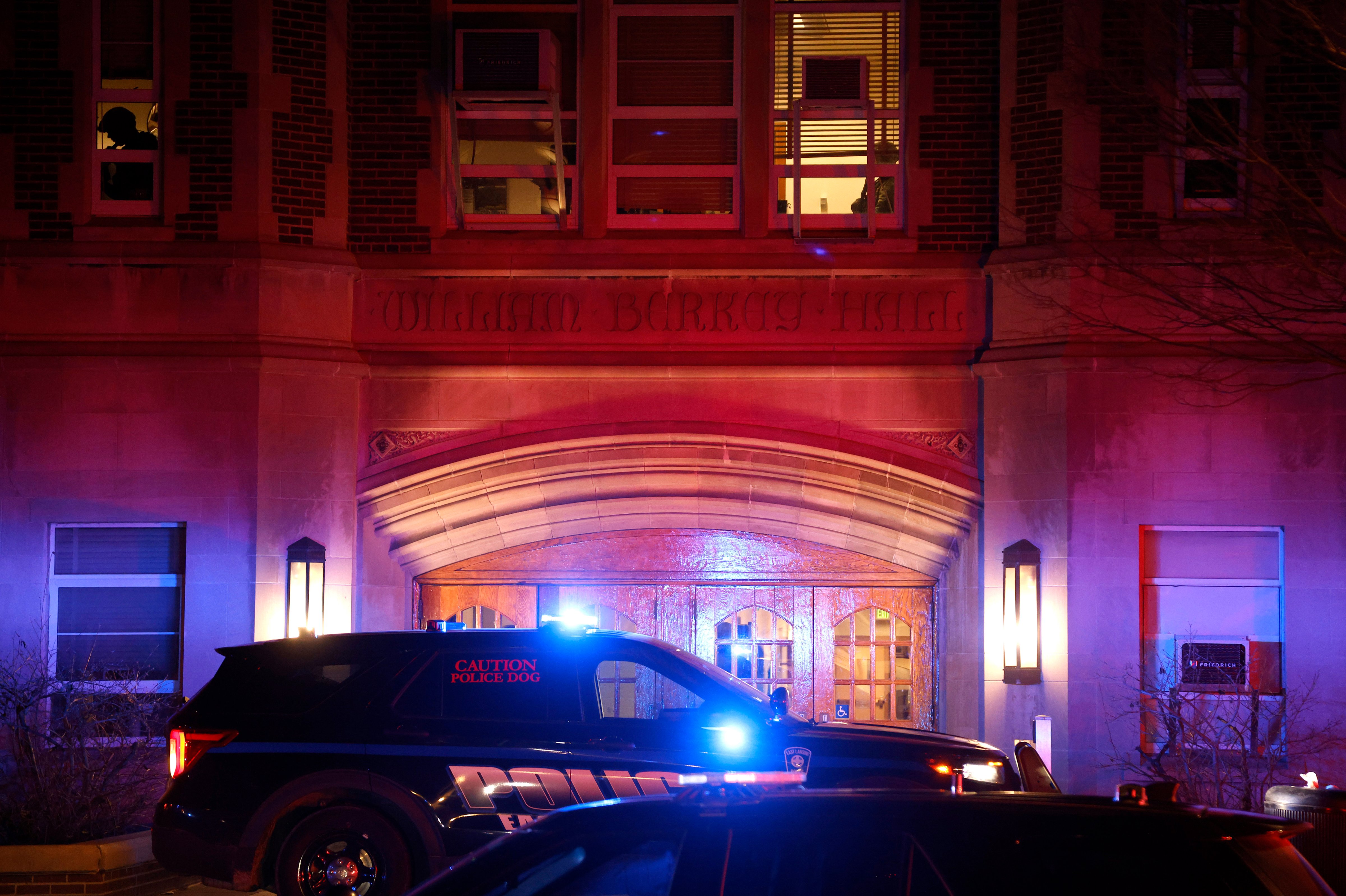 Police investigate the scene of a shooting at Berkey Hall on the campus of Michigan State University, late Monday, Feb. 13, 2023. (Al Goldis—AP)