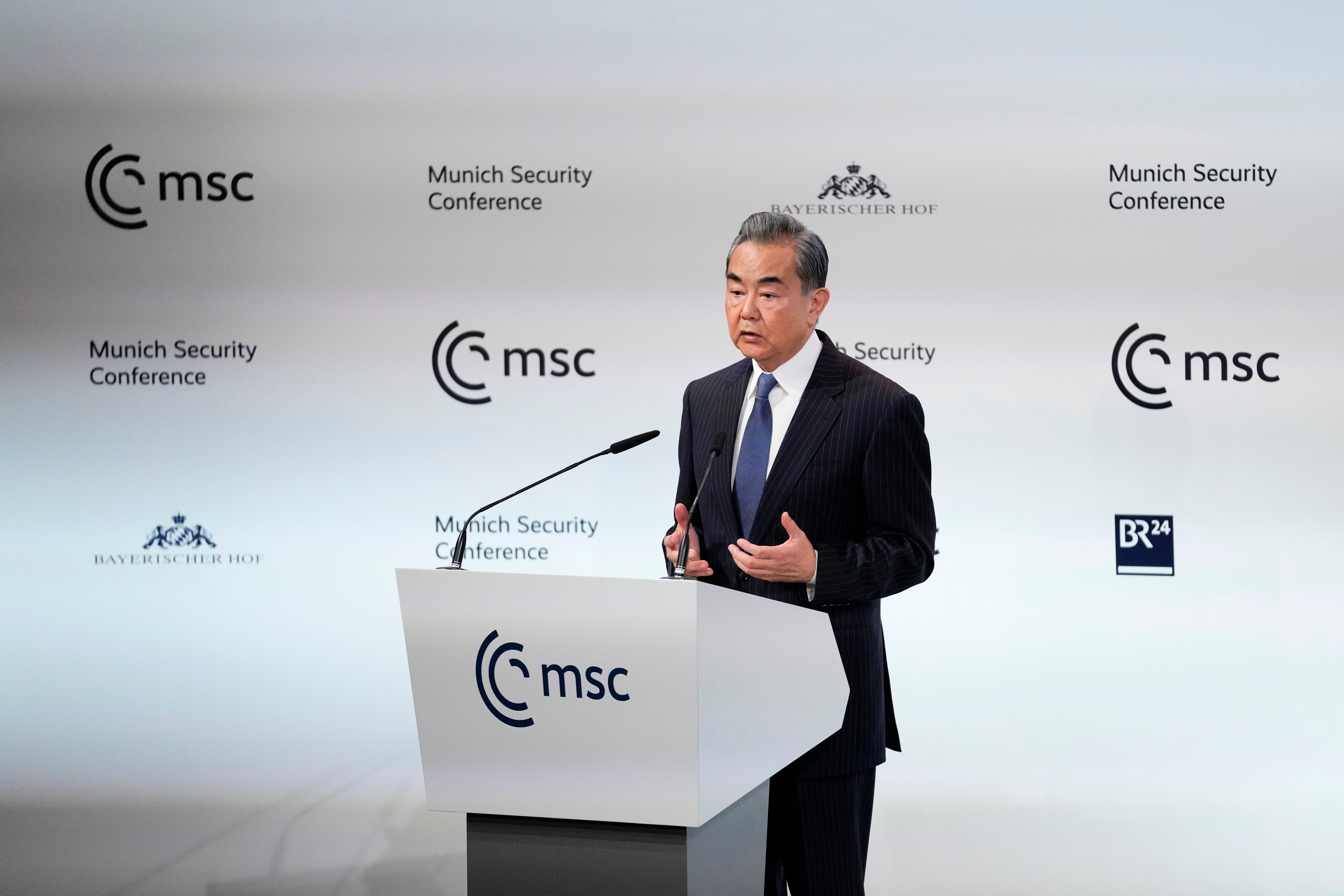 Wang Yi, director of China's Central Foreign Affairs Commission, speaks at the Munich Security Conference, Saturday, Feb. 18, 2023. (Petr David Josek—AP)