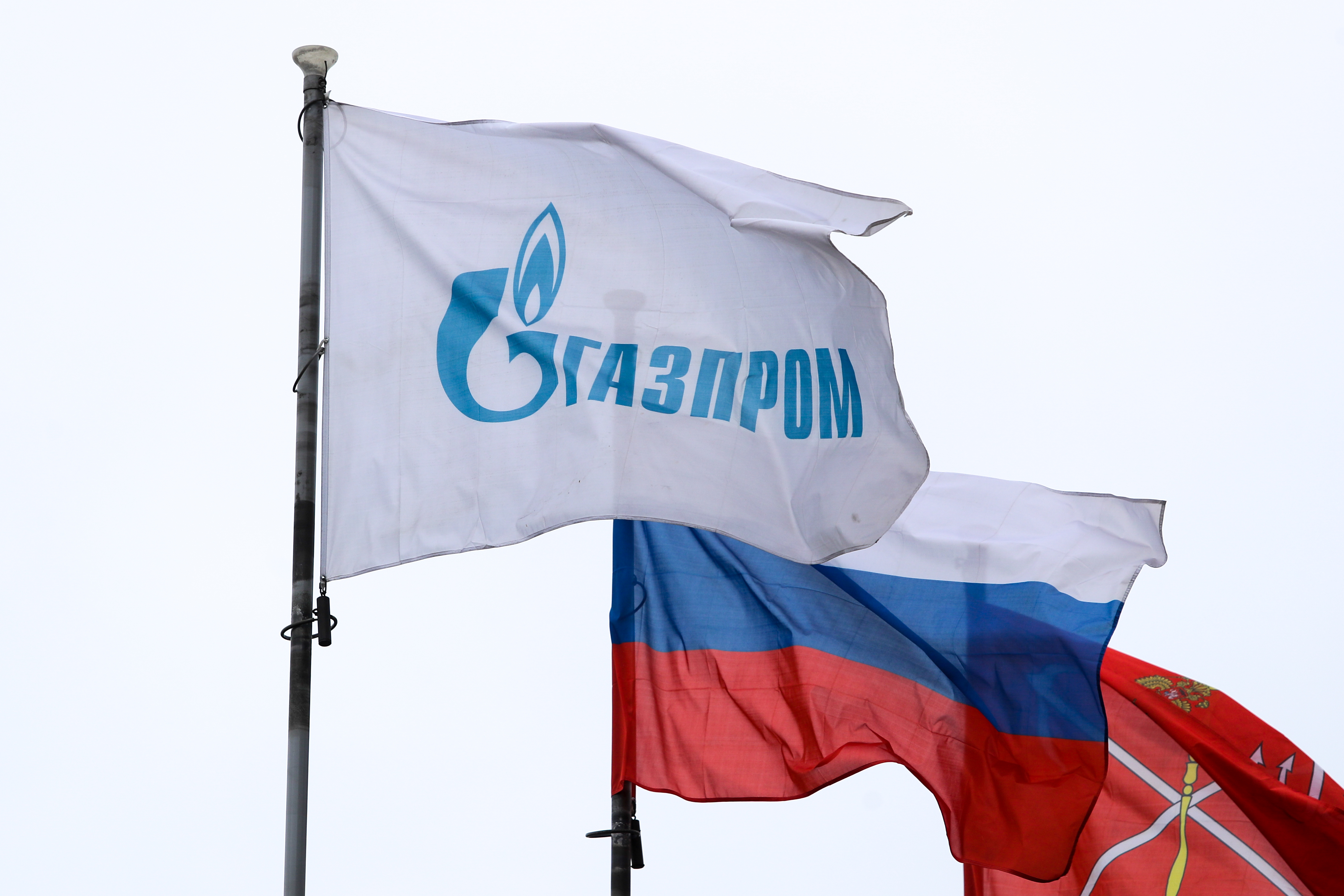 A flag with the Gazprom logo. (Photo by Igor Russak/picture alliance via Getty Images)