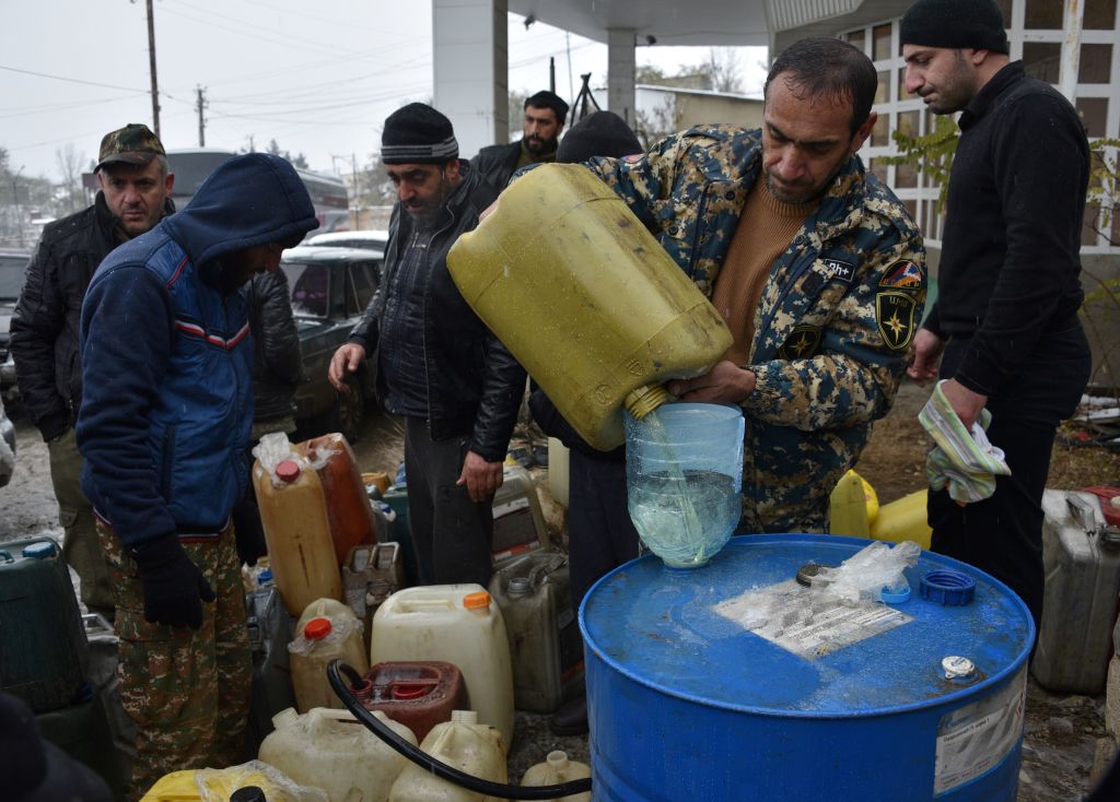 A vendor sells gasoline in the town of Lachin on November 29, 2020, after six weeks of fighting between Armenia and Azerbaijan over the Nagorno-Karabakh region. (Karen Minasyan—AFP/Getty Images)