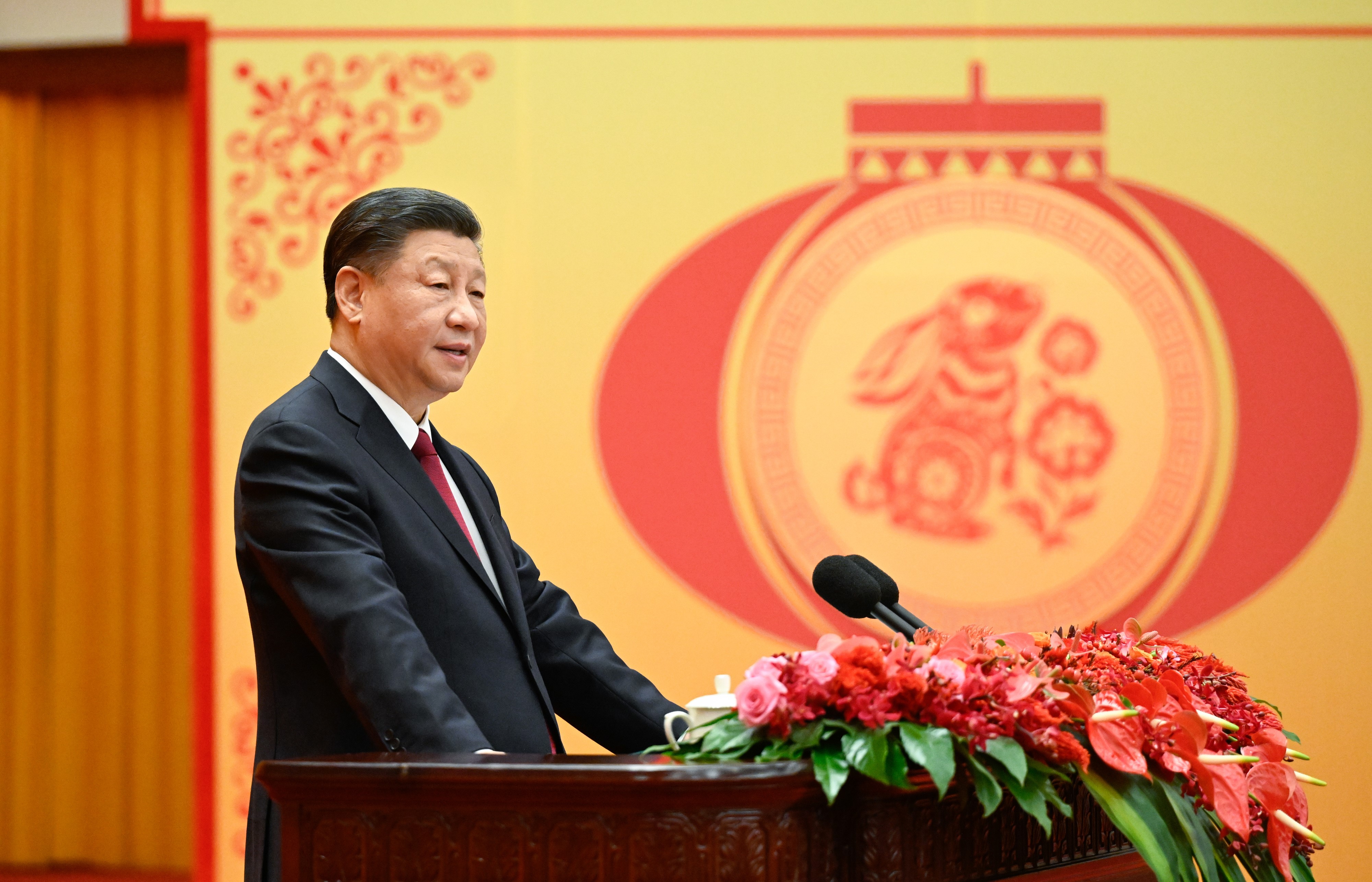 Xi Jinping speaks at a Spring Festival reception at the Great Hall of the People in Beijing, Jan. 20, 2023. (Li Xueren—Xinhua/Getty Images)