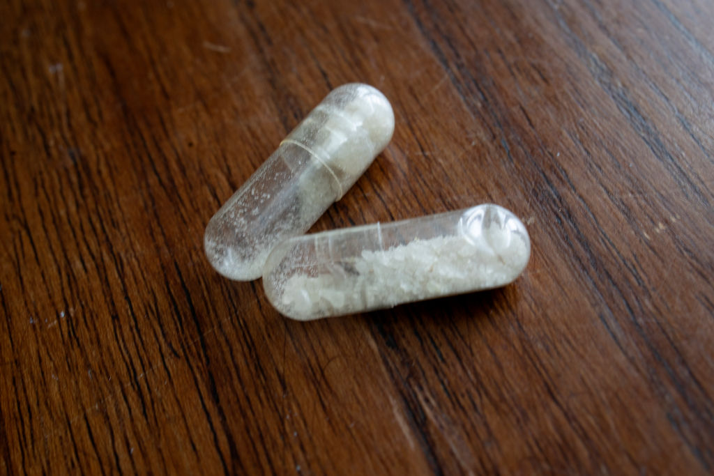 Two doses of MDMA sit on a table in New York City on May 27, 2022. (Andrew Lichtenstein/Corbis—Getty Images)