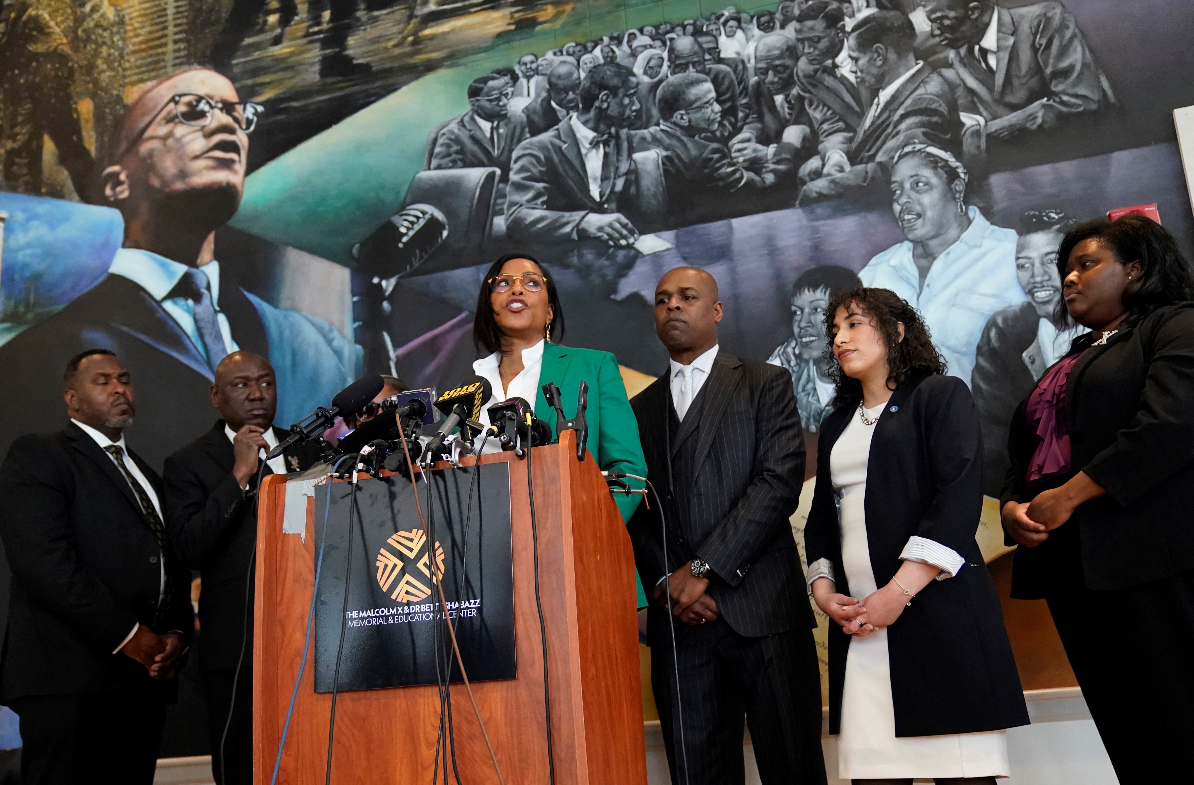 Ilyasah Shabazz (C), daughter of African-American activist Malcolm X, speaks alongside civil rights attorney Ben Crump (L) and co-counsel Ray Hamlin (C, R) during a press conference in New York on February 21, 2023 at the Malcolm X &amp; Dr. Betty Shabazz Memorial and Educational Center, formerly known as the Audubon Ballroom, where Malcolm X was shot dead at 39 on Feb. 21, 1965. (Timothy A. Clary–AFP via Getty Images)
